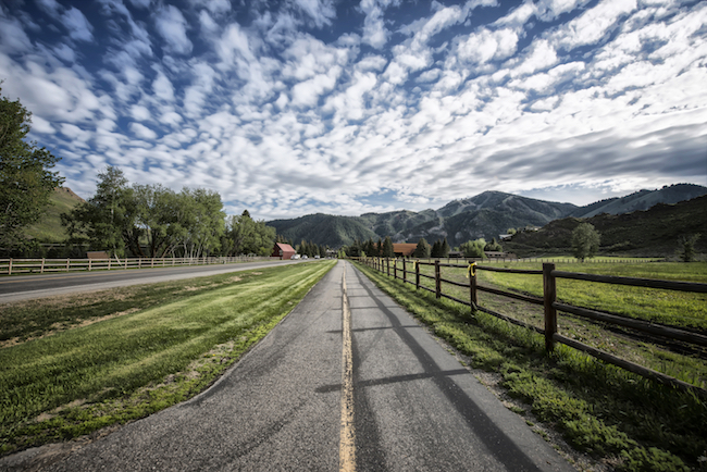 Scenic image of Sun Valley's bike path heading down into Ketchum towards Bald Mountain